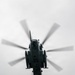 Helicopters land at a FARP site