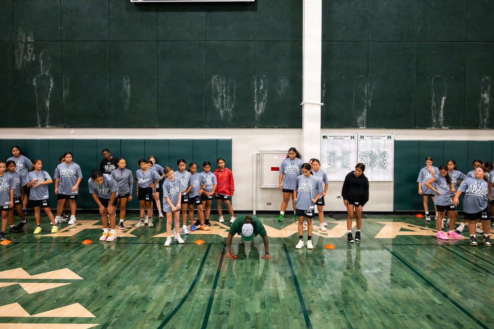 94th Army Air and Missile Defense Command  Soldiers assist University of Hawaii at Manoa’s Women’s Basketball team during Youth Impact Program
