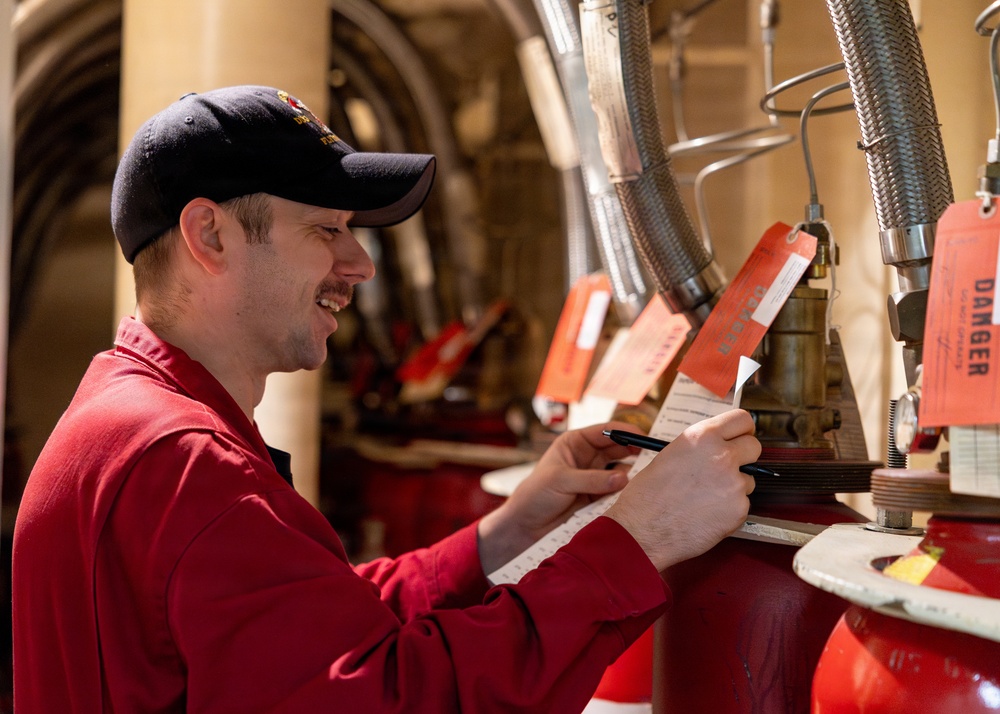 U.S. Navy Sailor Conducts Maintenance