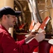 U.S. Navy Sailor Conducts Maintenance