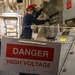 Navy Sailor Performs Electrical Maintenance Aboard U.S. Navy Vessel