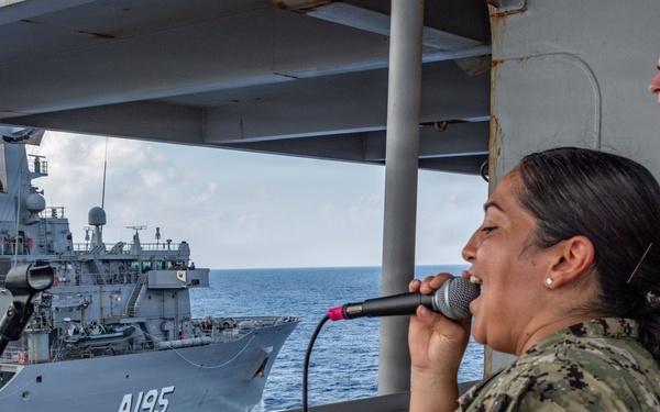 Pacific Partnership Band plays aboard Royal Australian Navy HMAS Choules (L100) during replenishment-at-sea