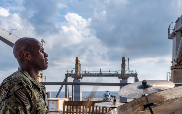 Pacific Partnership Band plays aboard Royal Australian Navy HMAS Choules (L100) during replenishment-at-sea