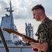 Pacific Partnership Band plays aboard Royal Australian Navy HMAS Choules (L100) during replenishment-at-sea