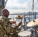 Pacific Partnership Band plays aboard Royal Australian Navy HMAS Choules (L100) during replenishment-at-sea