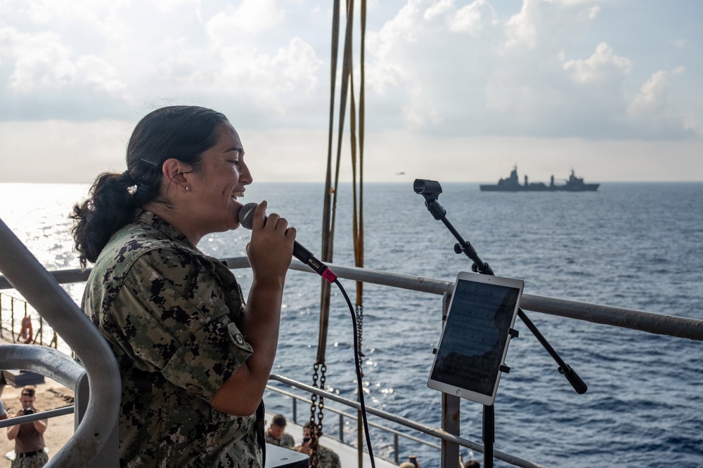 Pacific Partnership Band plays aboard Royal Australian Navy HMAS Choules (L100) during replenishment-at-sea