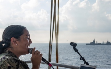 Pacific Partnership Band plays aboard Royal Australian Navy HMAS Choules (L100) during replenishment-at-sea