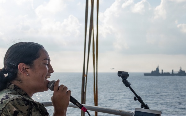 Pacific Partnership Band plays aboard Royal Australian Navy HMAS Choules (L100) during replenishment-at-sea