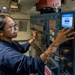 U.S. Navy Sailor Operates Industrial Laundry Equipment Aboard Naval Vessel
