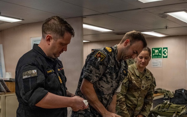 Pacific Partnership 2026 veterinarian conducts canine TCCC training aboard Royal Australian Navy HMAS Choules (L100)