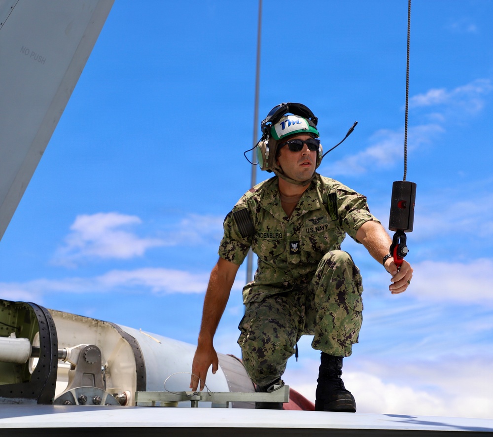 U.S. Navy Petty Officer Conducts Aircraft Maintenance Operations
