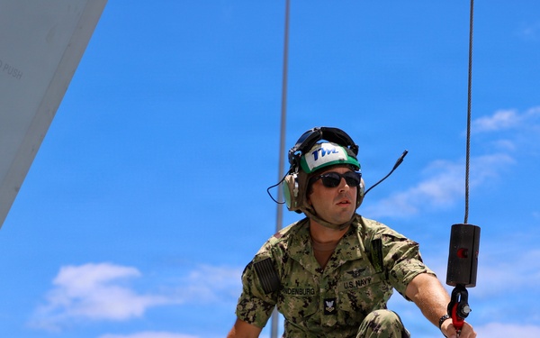 U.S. Navy Petty Officer Conducts Aircraft Maintenance Operations