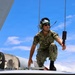 U.S. Navy Petty Officer Conducts Aircraft Maintenance Operations