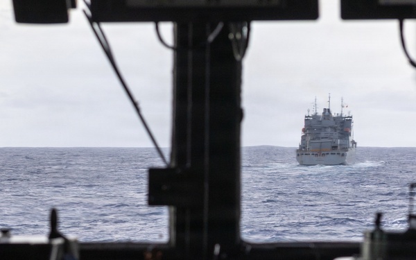 USS Mustin conducts a replenishment-at-sea with USNS Carl Brashear