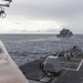 USS Mustin conducts a replenishment-at-sea with USNS Carl Brashear