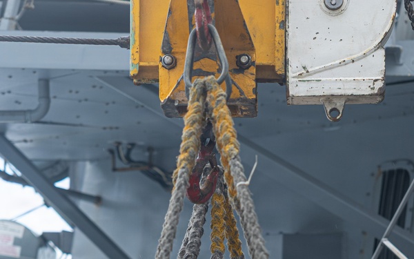 USS Mustin conducts a replenishment-at-sea with USNS Carl Brashear