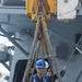 USS Mustin conducts a replenishment-at-sea with USNS Carl Brashear