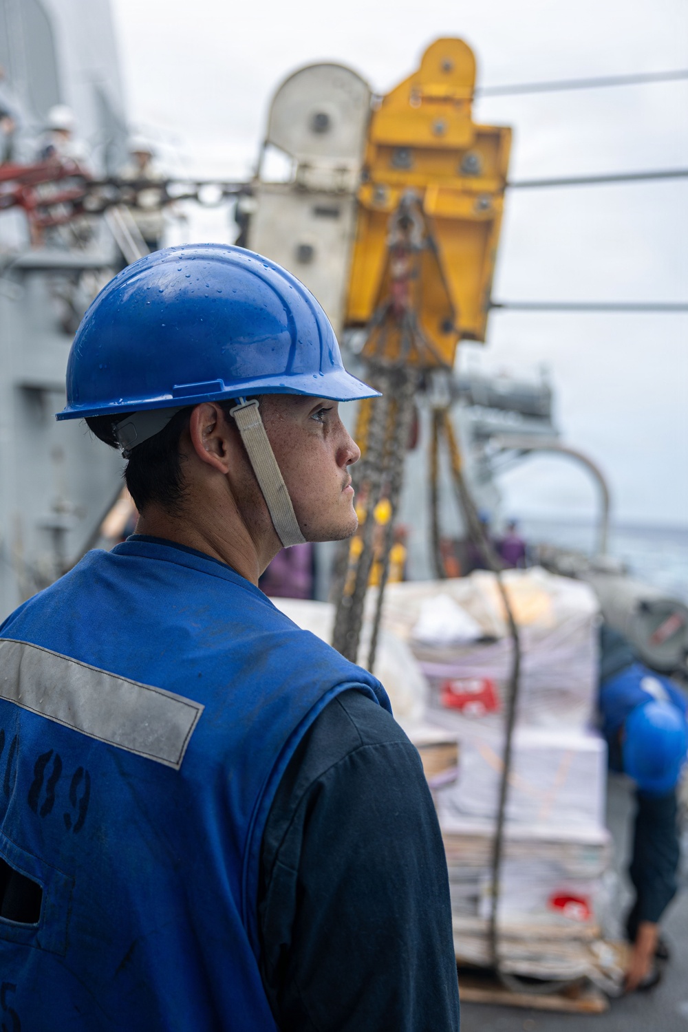 USS Mustin conducts a replenishment-at-sea with USNS Carl Brashear