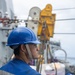 USS Mustin conducts a replenishment-at-sea with USNS Carl Brashear