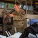 21st Theater Sustainment Command Soldier Evaluates Salvaged Drone Components