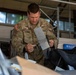 21st Theater Sustainment Command Soldier Evaluates Salvaged Drone Components