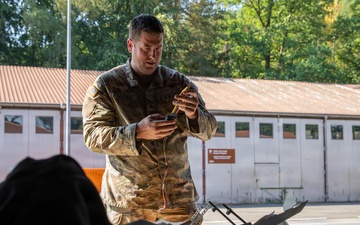 21st Theater Sustainment Command Soldier Evaluates Salvaged Drone Components