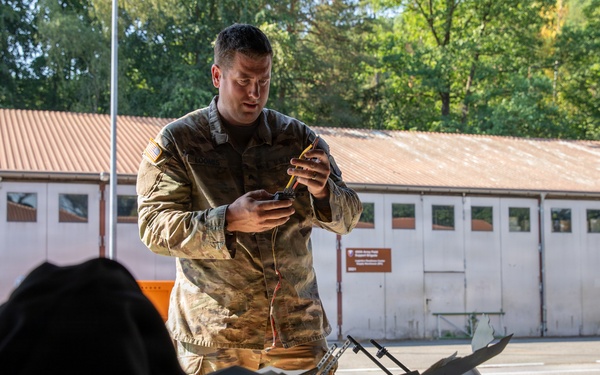 21st Theater Sustainment Command Soldier Evaluates Salvaged Drone Components
