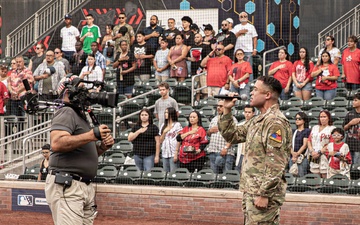 1st Armored Division Band opens game with the National Anthem