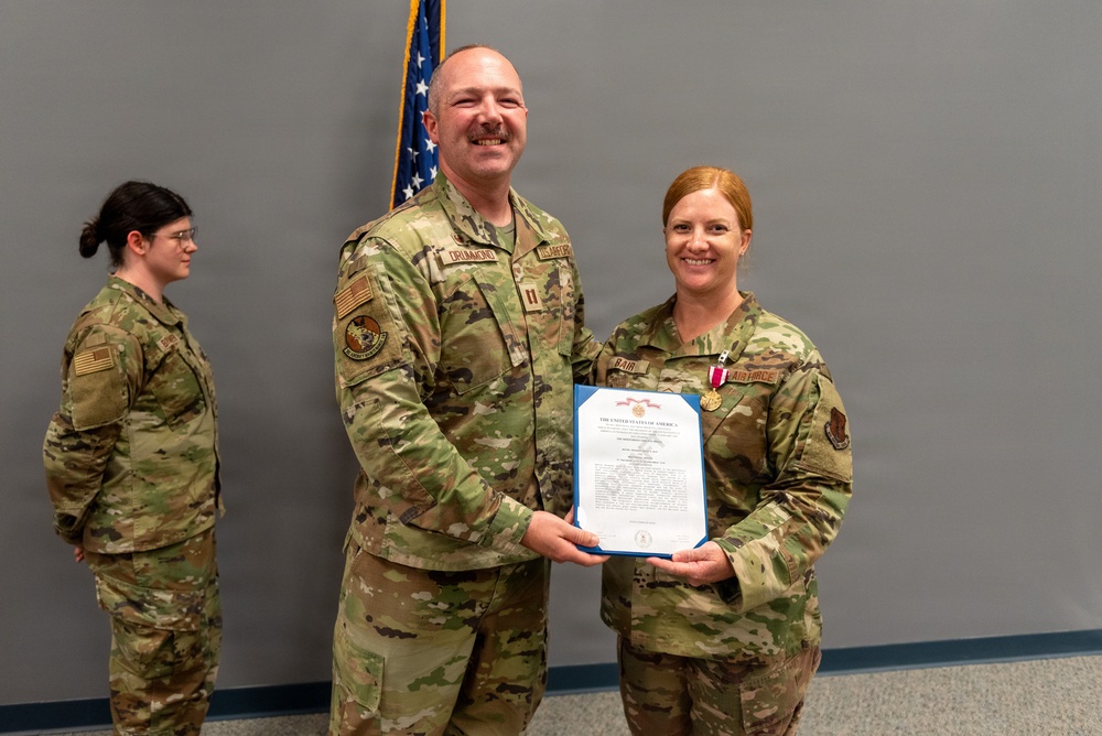 Illinois Air National Guard Master Sgt. Kayla Bair honored at retirement ceremony