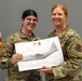 Illinois Air National Guard Master Sgt. Kayla Bair honored at retirement ceremony
