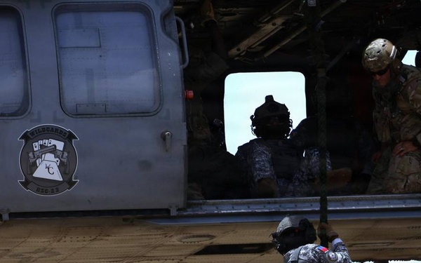 Philippine Coast Guard EOD joins multinational helicopter rope suspension techniques training event at RIMPAC 2026