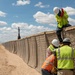 Contractors continue installation and repair of HESCO barriers in NDA 2