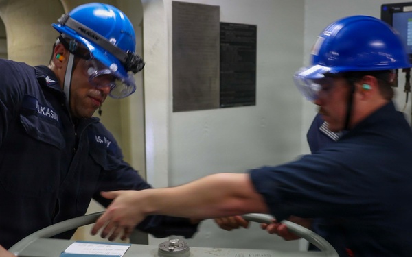 John F. Kennedy Conducts Anchor Testing