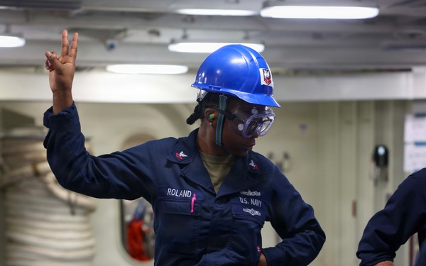 John F. Kennedy Conducts Anchor Testing