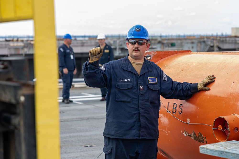 John F. Kennedy Conducts Deadload Testing