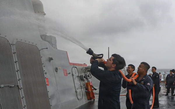 Frank E. Petersen Jr. Sailors Conduct a Fresh Water Wash Down