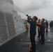 Frank E. Petersen Jr. Sailors Conduct a Fresh Water Wash Down