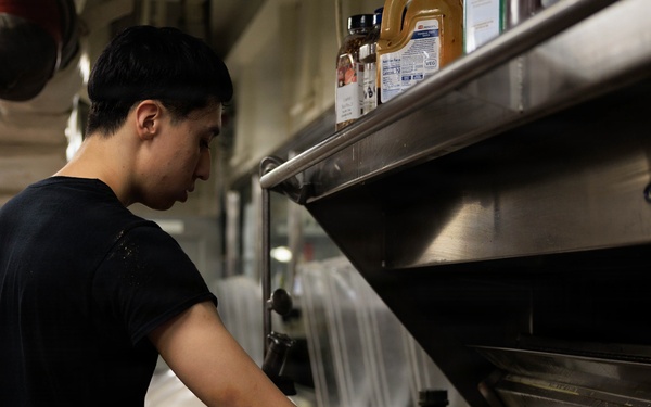 USS George H.W. Bush Sailors Conduct Food Preparation