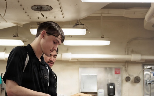 USS George H.W. Bush Sailors Conduct Food Preparation