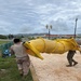 U.S. Marines assigned to MCED-P replace a playground for locals while deployed to Guam