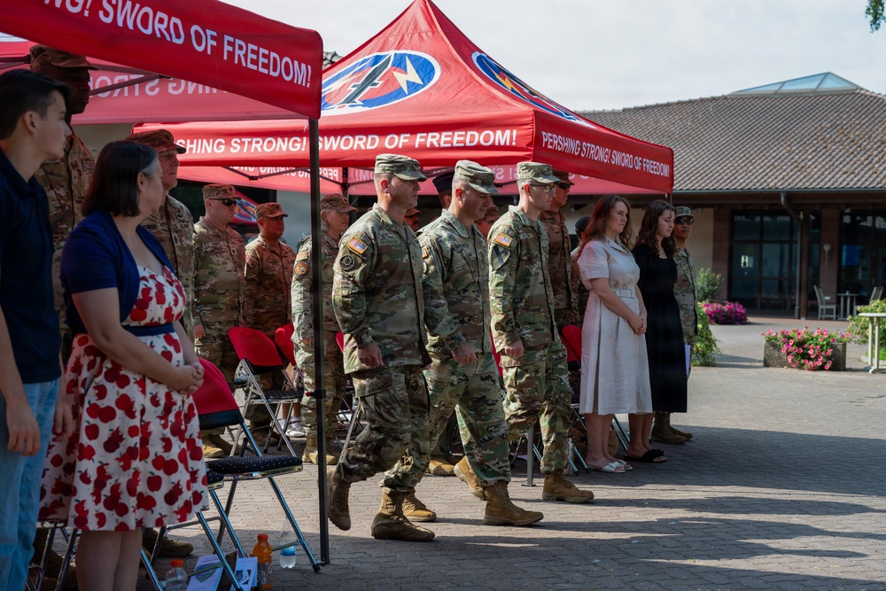 Col. Fausnaugh passes guidon to Col. Peterson at 19th BCD Change of Command