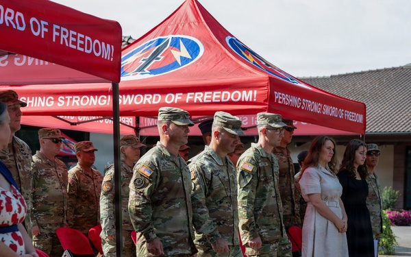 Col. Fausnaugh passes guidon to Col. Peterson at 19th BCD Change of Command