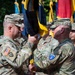 Col. Fausnaugh passes guidon to Col. Peterson at 19th BCD Change of Command