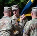 Col. Fausnaugh passes guidon to Col. Peterson at 19th BCD Change of Command