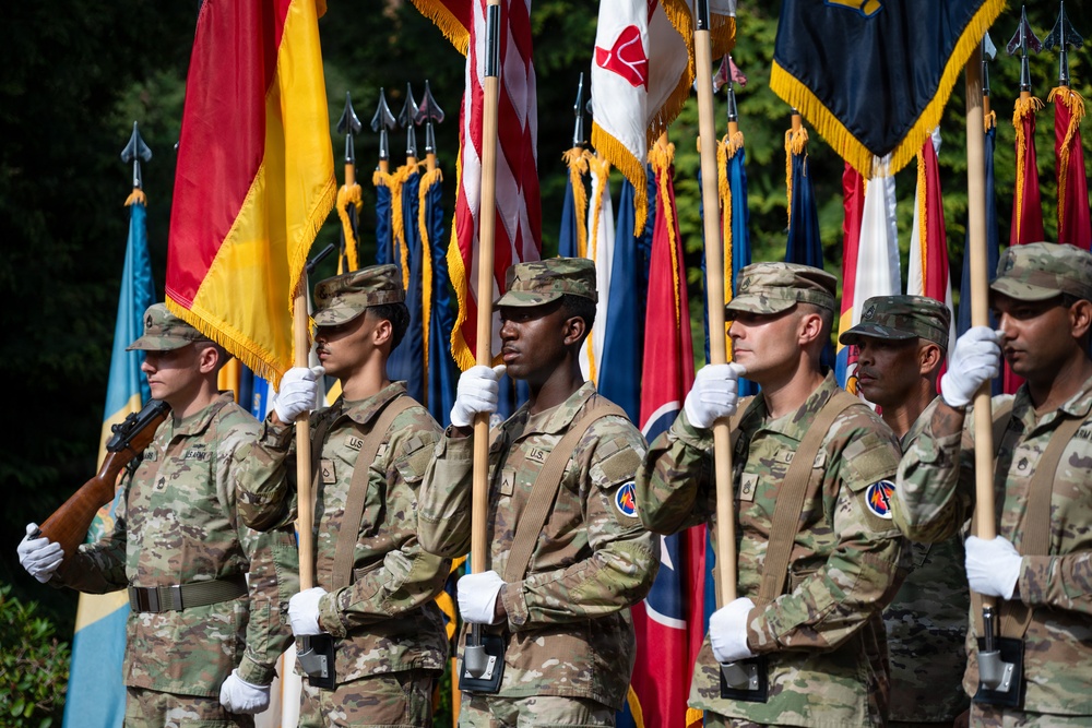Col. Fausnaugh passes guidon to Col. Peterson at 19th BCD Change of Command