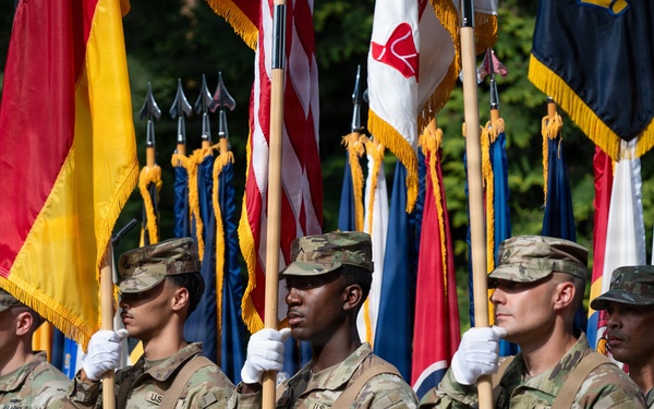 Col. Fausnaugh passes guidon to Col. Peterson at 19th BCD Change of Command