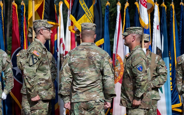 Col. Fausnaugh passes guidon to Col. Peterson at 19th BCD Change of Command