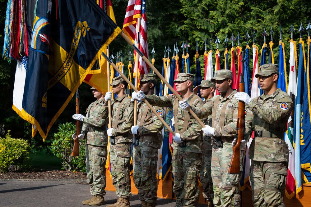 Col. Fausnaugh passes guidon to Col. Peterson at 19th BCD Change of Command