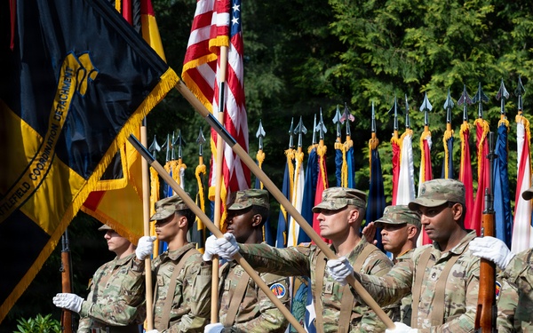 Col. Fausnaugh passes guidon to Col. Peterson at 19th BCD Change of Command
