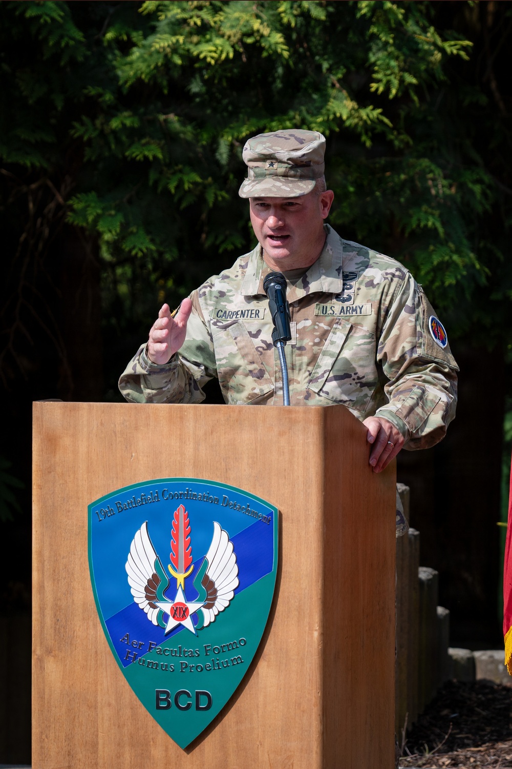 Col. Fausnaugh passes guidon to Col. Peterson at 19th BCD Change of Command